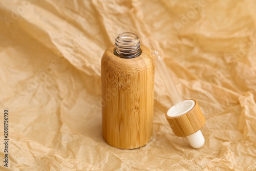 Bottle with cosmetic produc...