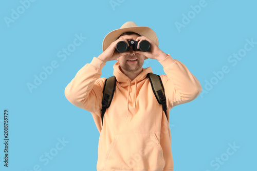 Male tourist with backpack ...