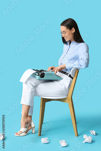 Beautiful young woman worki...