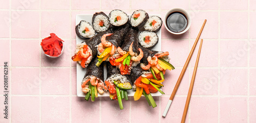 Assorted sushi rolls and ha...