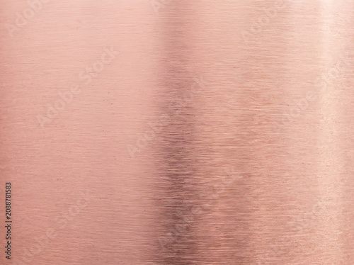 brushed rose gold metallic texture background, fine linear grain, warm pink gold tone, elegant modern feel, high resolution macro detail, commercial stock photo