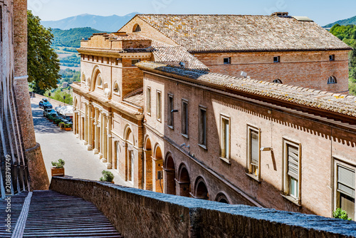 Fotografie Historic buildings with traditional tiled roofs lining Corso Giuseppe Garibaldi