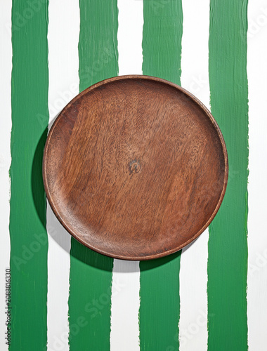 empty wooden table on striped painted table top