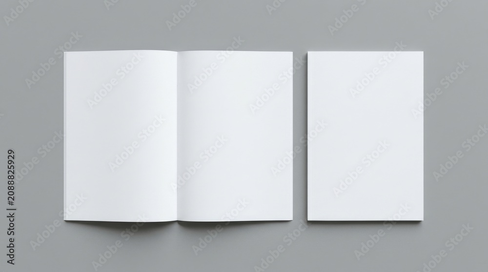Fototapeta premium Open and closed blank brochures on grey background, top view. Mock up for design