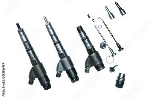 Common rail diesel fuel injector repair process layout with dirty old part clean repaired unit and disassembled components on white background