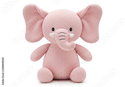 Pink soft toy elephant with big ears sitting isolated on white background
