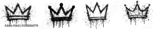 Fotografie four Black grunge crown icons with paint splatter