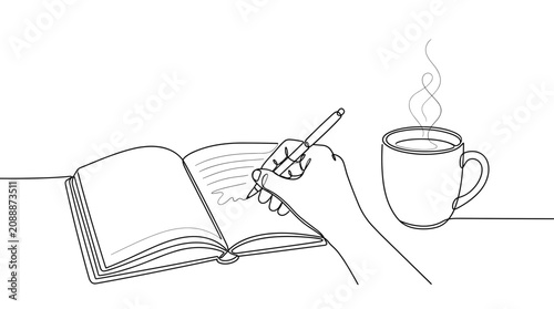 Hand writing in notebook with coffee cup steam rising