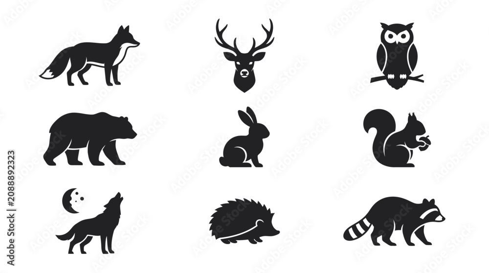 Obraz premium Black silhouettes of forest animals side view.