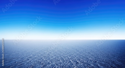 Vast, empty landscape where the flat plain meets the endless blue sky, creating a minimalist, seamless natural background, abstract, blank, horizon