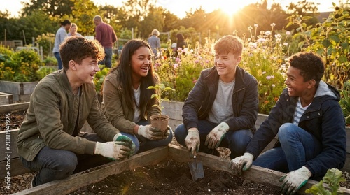 Diverse youth group planting in community garden.