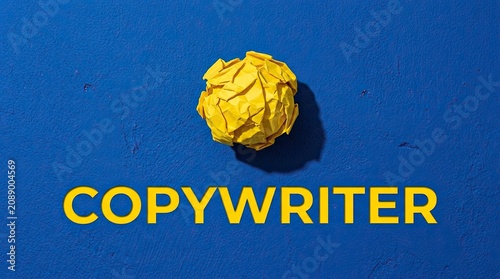 Yellow crumpled paper ball on blue textured background with bold typography and ample white space for text overlay representing creative writing editing with stationery business concept fiction