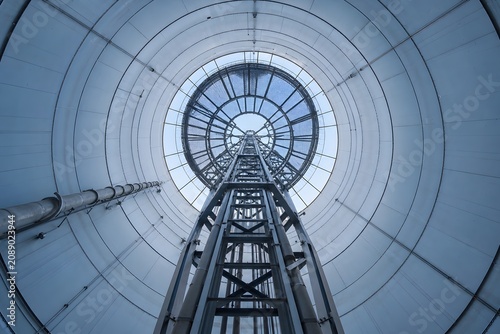 Upward View of Circular Architectural Skylight and Steel Framework