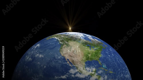  Sunrise over earth in space.