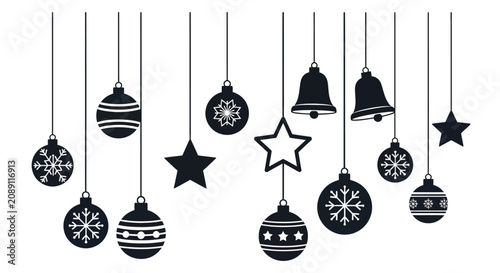 Photography Black christmas ornaments and decorations hanging on strings with decorations in