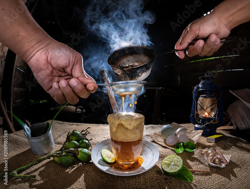 Making the traditional Minangkabau drink, 