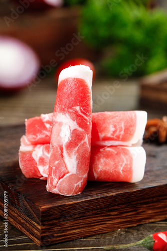 Premium Raw Meat Rolls on Wooden Board - Gourmet Beef Lamb Cuts for Hot Pot Cooking