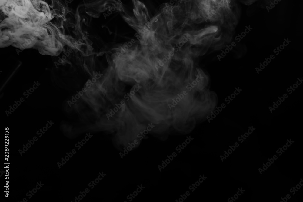 Fototapeta premium White smoke over black background for overlay design