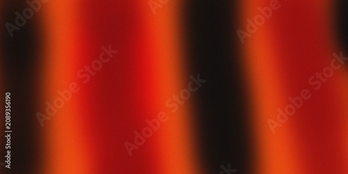 Vibrant abstract background with blurred red and orange stripes on black