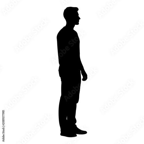 Silhouette of a Standing Man in Profile View.