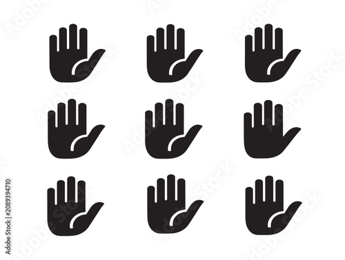 Stop hand gesture icon set featuring solid black silhouettes in flat style