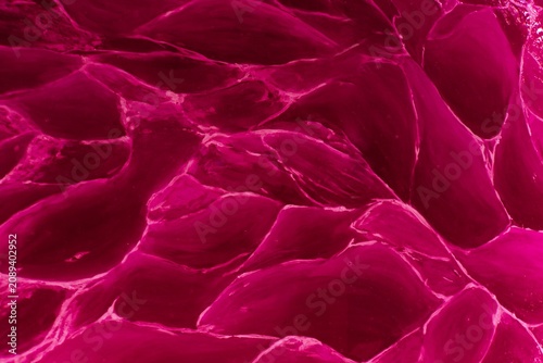 
The pink-red background with a subtle wave texture creates an elegant and modern look. Fluid curves and soft color transitions add depth, dynamism, and a pleasing visual appeal.