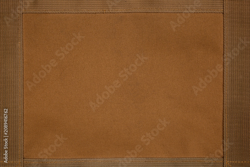 Brown tactical fabric texture background