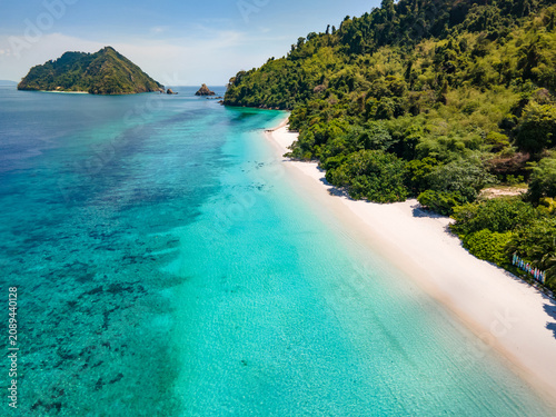 Fotografie Aerial drone view of tropical landscape over Madam Beach of Nyaung Oo Phee Island in the Mergui Archipelago, Myanmar