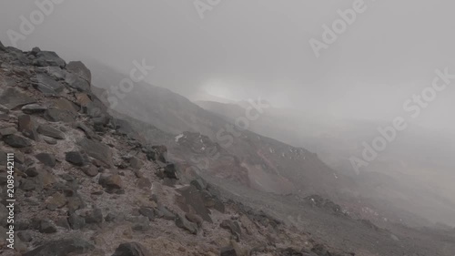 View of Mount Little Ararat from the slope of Mount Greater Ararat in snow and bad weather, Turkey