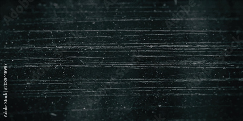 Bilde på lerret Dark worn metal texture with fine horizontal scratches and dust particles surfac