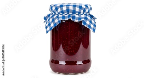 A glass jar filled with dark red berry jam, sealed with a blue and white checkered fabric lid cover, isolated on a white background