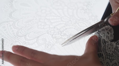 Precision trimming lace applique for handcrafted wedding dress creation