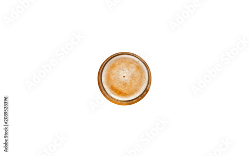 Golden Lager beer with foam head in a glass seen from above during a soft studio light isolated on transparent background