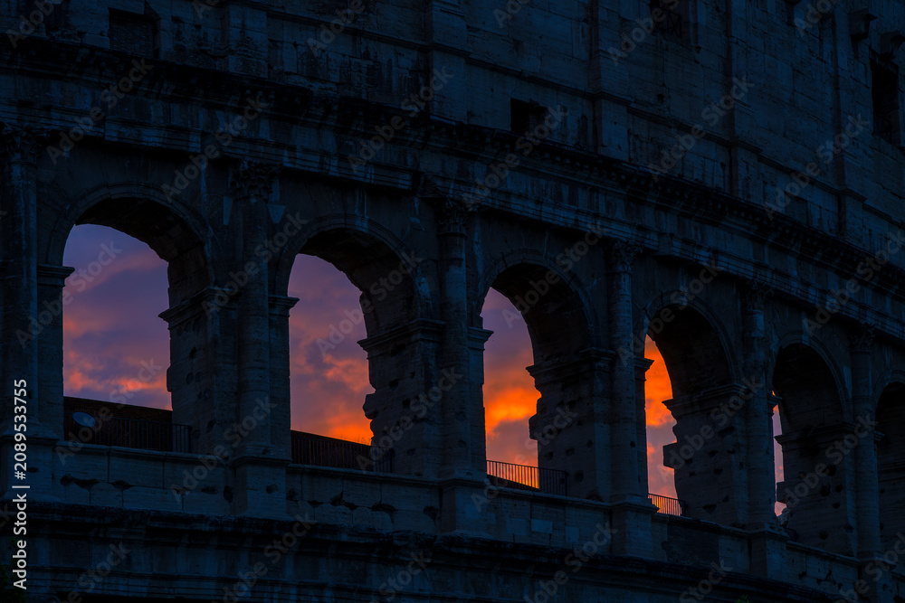 Fototapeta premium Colosseum Arches Silhouette at Dramatic Sunset Rome