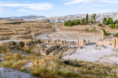 Photos Panoramic View of the Oval Plaza and Roman Ruins in Jerash, Jordan
Wide panoramic view of the Oval Plaza, colonnaded streets, and ancient Roman ruins in the archaeological city of Jerash, Jordan
