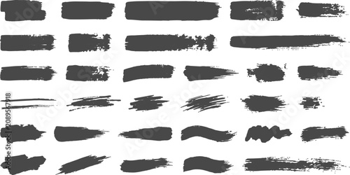 Black Artistic Brush Stroke Set. Hand painted grunge paint swipes and textured ink marks collection. Versatile abstract design elements for creative layouts.