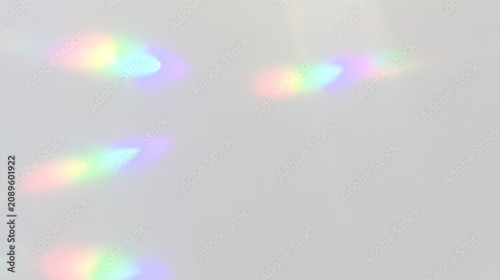 Fototapeta premium Transparent Rainbow Prism Overlay with Light Refraction and Lens Flare Effect, Crystal Glass Reflection, Colorful Spectrum Background PNG