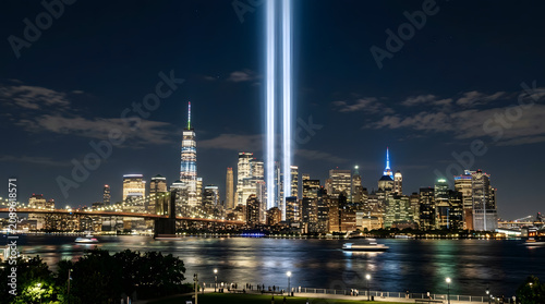 Patriot day tribute illuminated skyline of lower manhattan honoring 9 11 memorial with twin beams of light