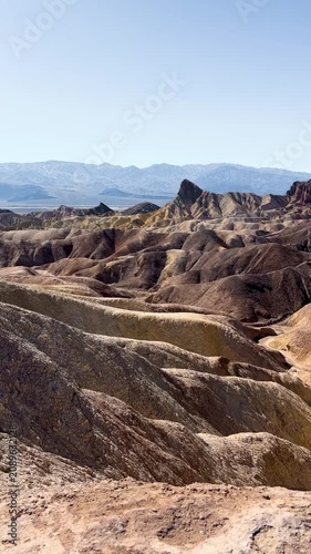 Daylight view of Death Valley at Zabriskie Point. Travel and adventure vertical footage