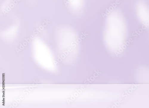 Empty purple studio room for product presentation with shadow of tree leaves on the wall. Interior concrete wall and floor design backdrop for displaying products. Shadow overlay effect.
