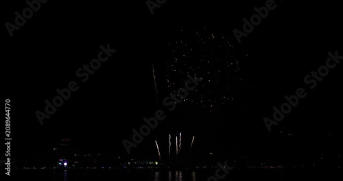 Celebration greeting Beautiful fireworks colorful fireworks on the beach for abstract background , anniversary, celebration , 4th independence day and new year background or wallpaper.