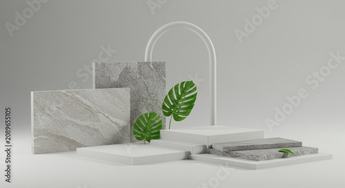 Minimalist white marble product display setup.