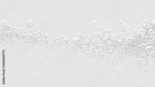 Foto Bubbles rise in water on transparent background during a bright day