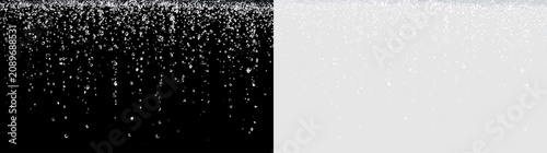 Water droplets falling on a surface with a clear background creating a smooth texture in motion during an indoor setting