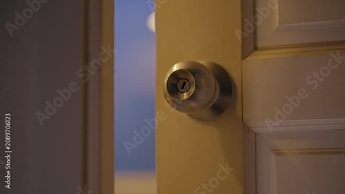 Close Up View of Interior Door Slowly Opening to Narrow Gap Before Suddenly Slamming Shut, Suspense, Fear, Home Intrusion, Horror Scene