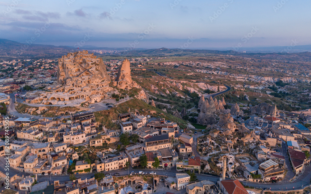 Fototapeta premium Aerial View of Uchisar Castle and Goreme Landscape in Cappadocia Nevsehir Turkey with Fairy Chimneys and Volcanic Rock Formations