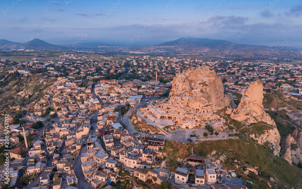 Fototapeta premium Aerial View of Uchisar Castle and Goreme Landscape in Cappadocia Nevsehir Turkey with Fairy Chimneys and Volcanic Rock Formations