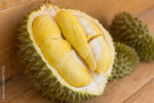 Close Up Durian Monthong on Black Wood Background 