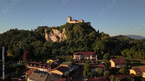 Sunset Drone View of Rocca di Angera Castle on Lake Maggiore