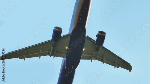 Canvastavla Passenger airplane taking off and flying into blue sky